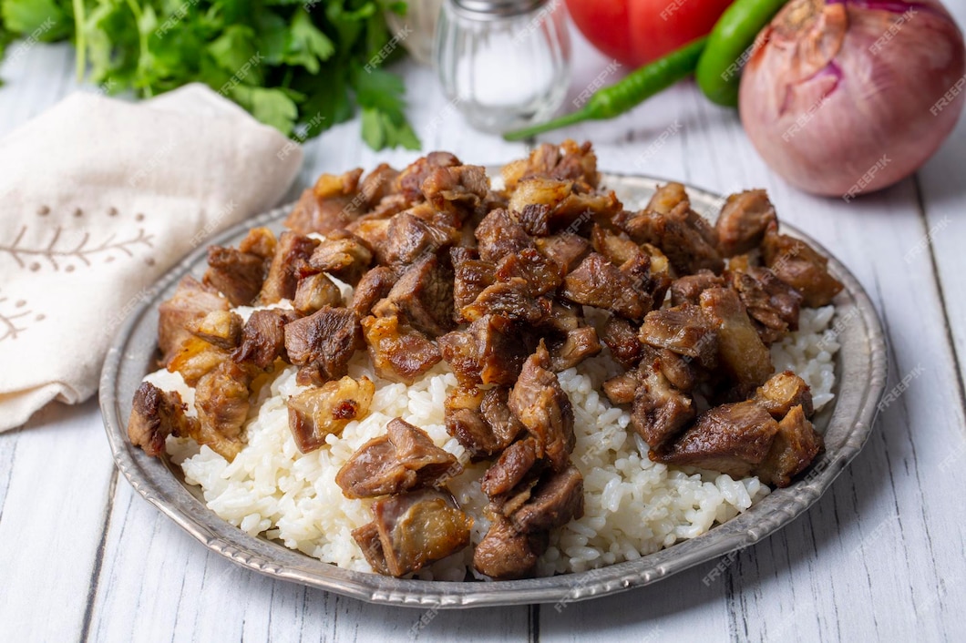 Premium Photo | Turkish meat et kavurma with rice pilav turkish name ...