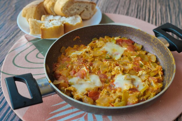 Turkish Menemen omelet in a frying pan