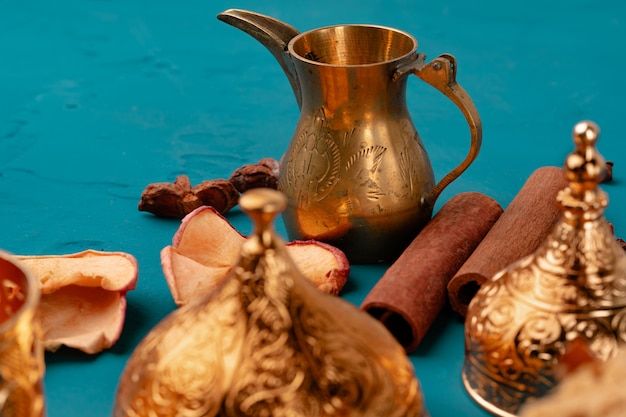 Turkish metal tableware on wooden table close up