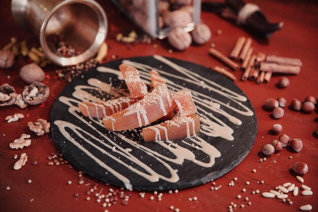 Photo turkish pumpkin dessert with tahini, tahinli kabak tatlisi.