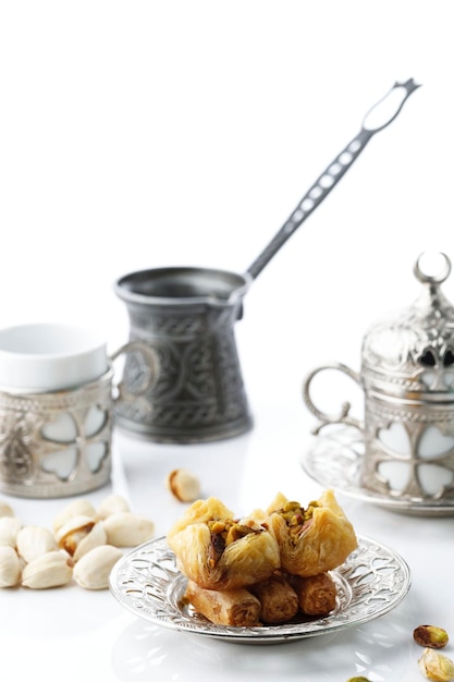 Turkish Ramadan Dessert Baklava Served with Turkish Tea or Coffee Isolated on White