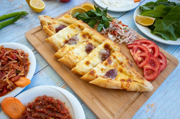 Turkish Sausage Pide or Sausage pizza Sucuklu Pide