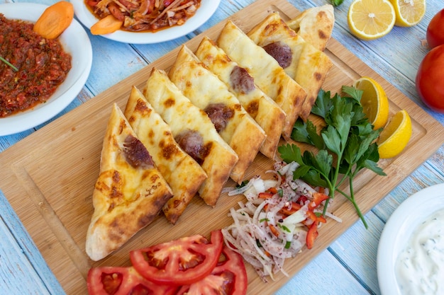 Turkish Sausage Pide or Sausage pizza Sucuklu Pide