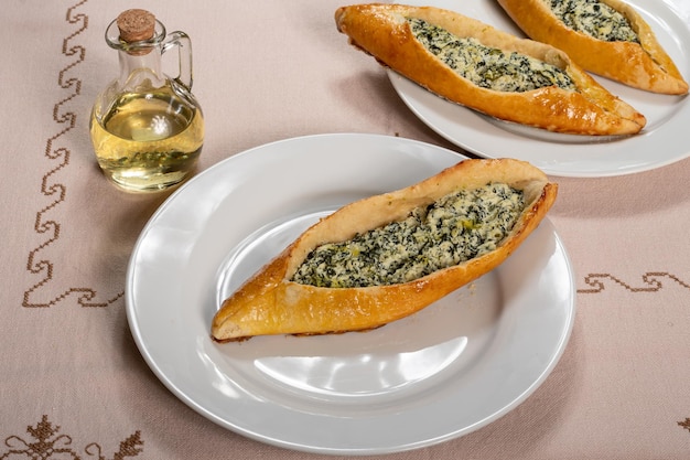 Turkish sfiha stuffed with ricotta cheese and spinach