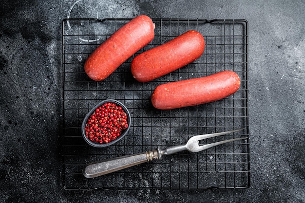 Turkish Sucuk beef meat sausage Black background Top view