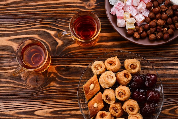 Turkish sweet baklava on plate with turkish tea