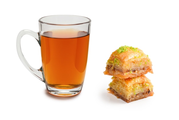 Turkish sweet baklava with turkish tea isolated on a white background