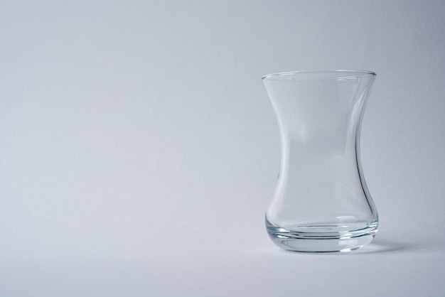 Turkish tea glass cup on a white background.