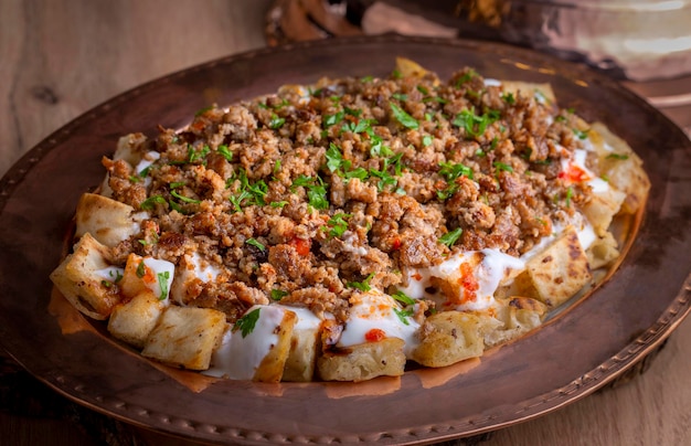 Turkish traditional food of Kastamonu tirit meal yoghutr and bread Turkish name tirit kebabi