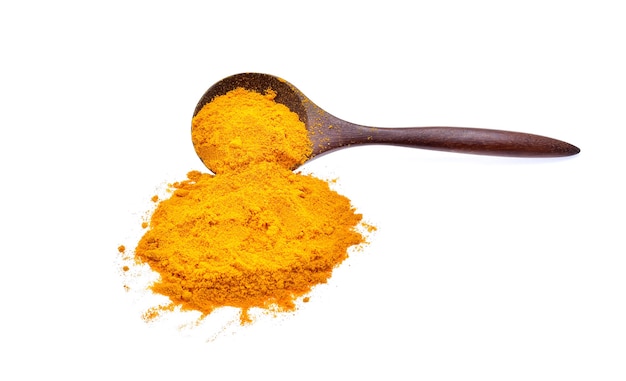 Turmeric powder isolated on white background