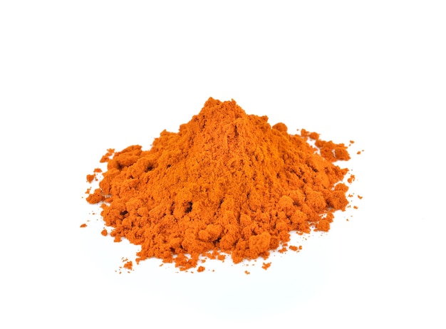 Turmeric powder on white wall