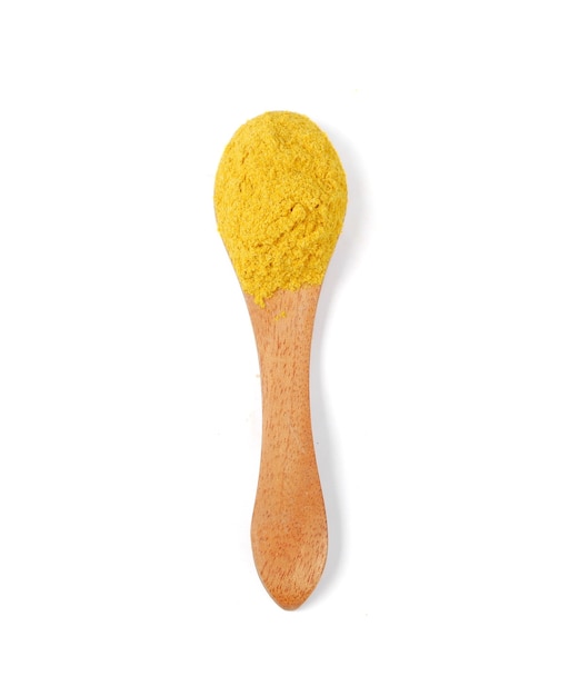 Turmeric powder with wooden spoon isolated on white background,Top view