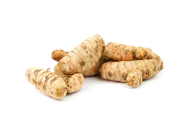 Turmeric roots isolated on white background Curcuma rhizome