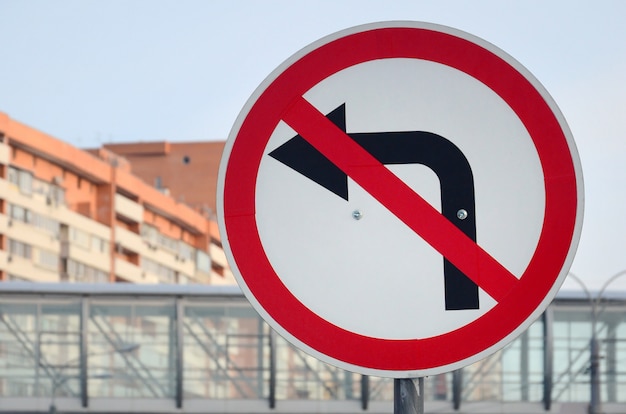 Turn left is prohibited. Traffic sign with crossed out arrow to the left