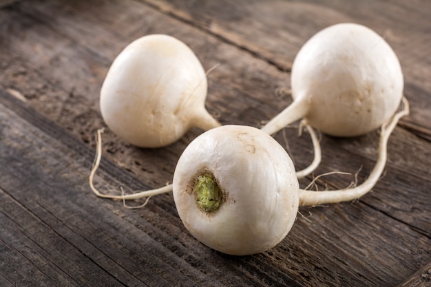 Turnip on wooden table