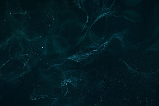 Photo turquoise on black abstract artistic texture