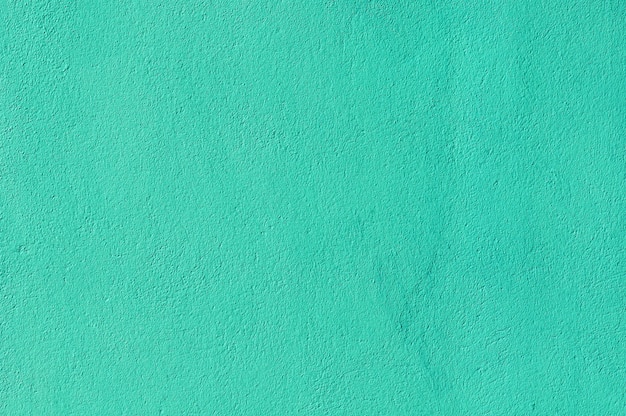 Turquoise grunge cement wall. background or texture