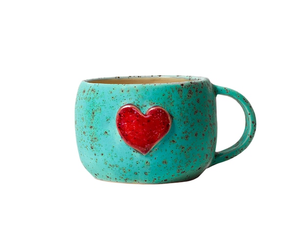 Turquoise mug with a red heart. Isolated image