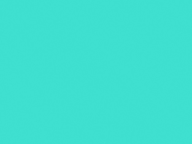 Turquoise paper texture with noise speckles