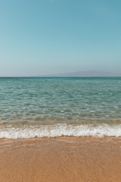 Turquoise water in Hawaii Beach or Blue Lagoon in Naxos island Greece