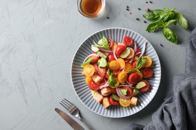 Tuscan panzanella with tomatoes and bread top view