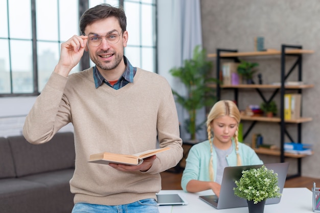 Photo tutor at home and young girl student