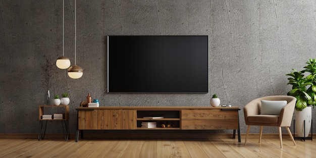 Photo tv on cabinet the in modern living room the concrete wall,3d rendering