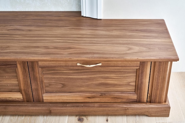 TV cabinet of veneer and solid walnut