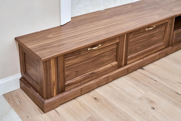 TV cabinet of veneer and solid walnut