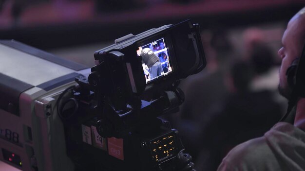 Photo tv camera in a concert hal professional digital video camera tv broadcast of the event from the