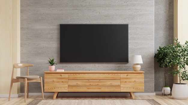 TV-muursteun op kabinet de in moderne woonkamer de concrete muur, het 3d teruggeven