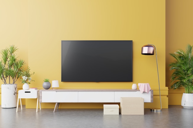 TV wall console in modern living room with lamp,table,flower and plant on yellow illuminating wall background,3d rendering