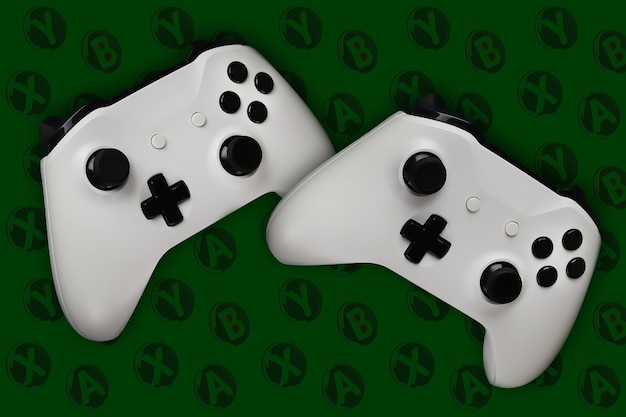 Twee gaming-gamepads tijdens de vlucht op een donkergroene achtergrond met knoppen voor games