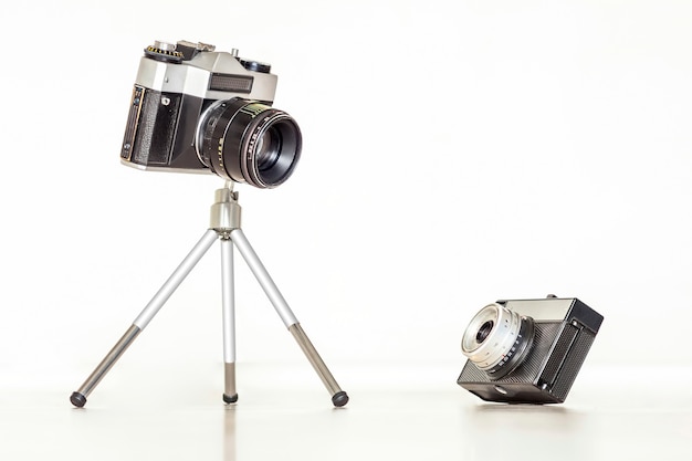 Twee vintage camera's bij elkaar. Groot en klein concept.