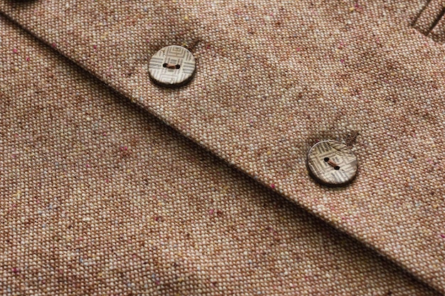 Tweed jacket with its details of buttons