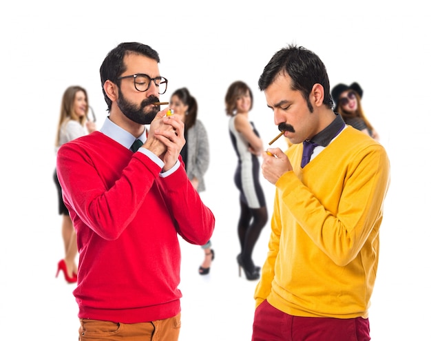 Twin brothers smoking 