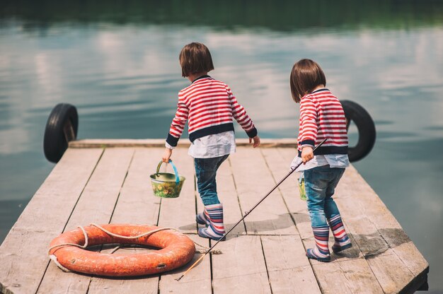 Twin sisters on Wooden pier