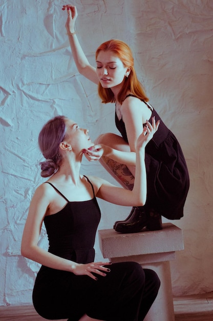 Twins in black dresses