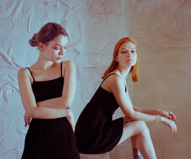 Twins in black dresses