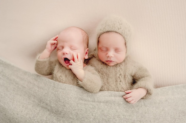 Twins newborn studio portrait