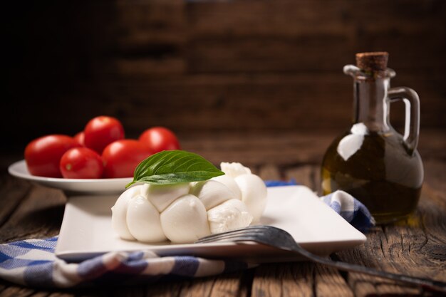 Twisted fresh Italian mozzarella Treccia. Italian soft cheese close up