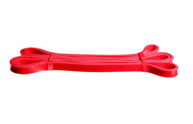 Twisted red rubber wrist band isolated on white High resolution photo