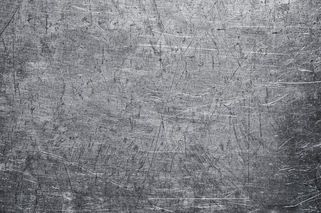 Photo twisted sheet of old metal texture, weathered steel plate wall