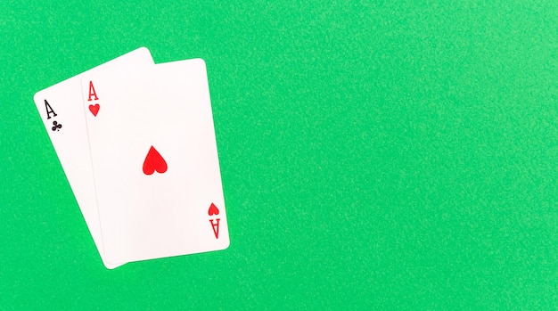 Two aces on a green background Copy space Top view