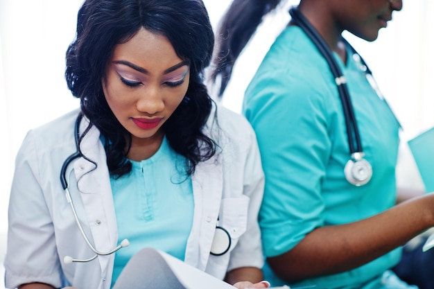 Two african american pharmacist working in drugstore at hospital pharmacy African healthcare