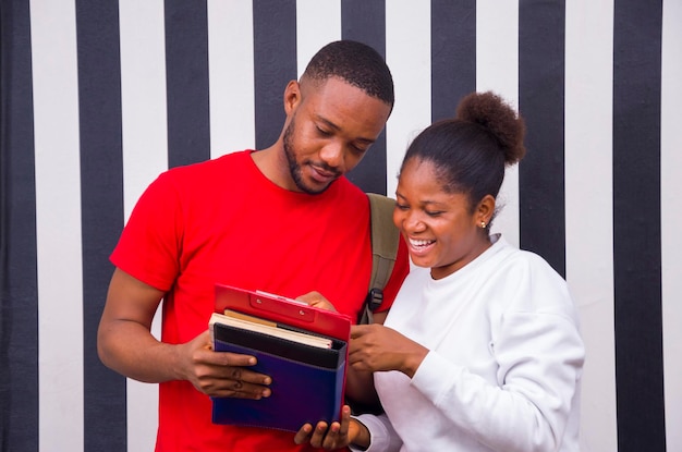 Two african student studying their books