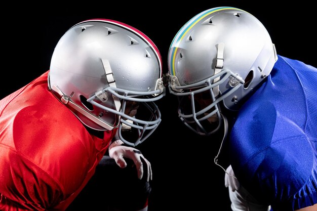 Photo two american football players head to head