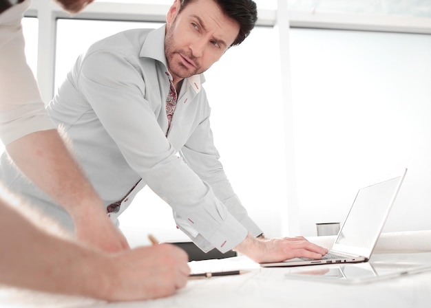 Two architects use a laptop for work photo with copy space