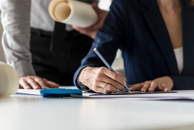 Two architects at work in their office