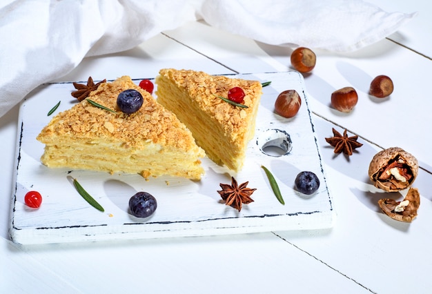 Two baked cakes Napoleon with cream 